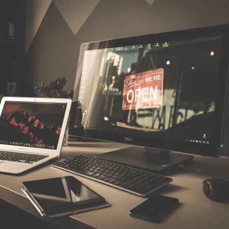 computer set up on a workspace